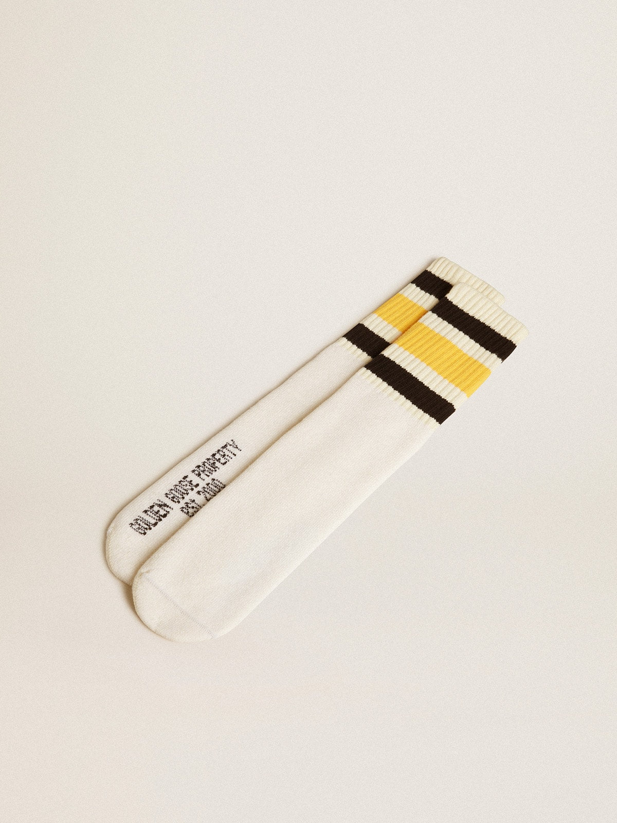 Worn-white socks with distressed details and black and yellow stripes| Golden Goose