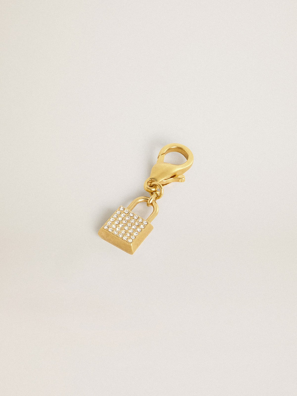 Lock-shaped charm in gold-colored brass with crystals| Golden Goose