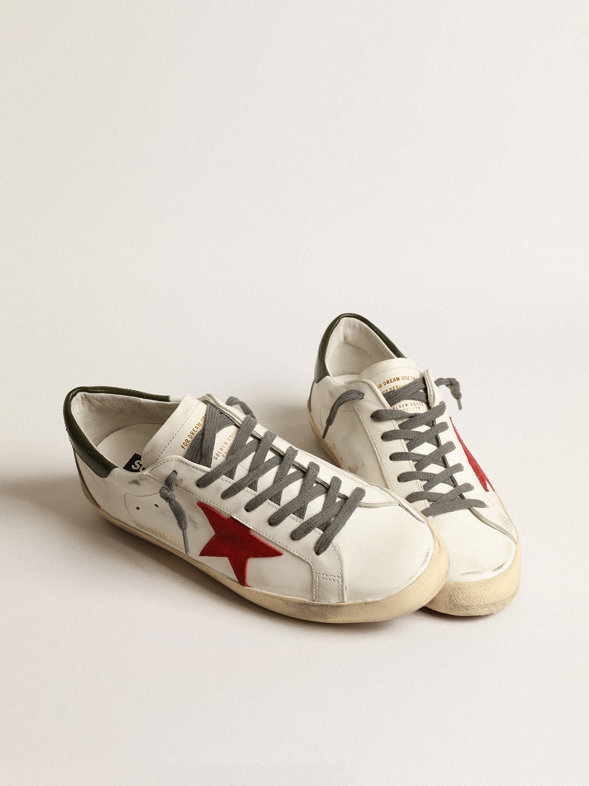 Men's Super-Star with red suede star and green leather heel tab| Golden Goose