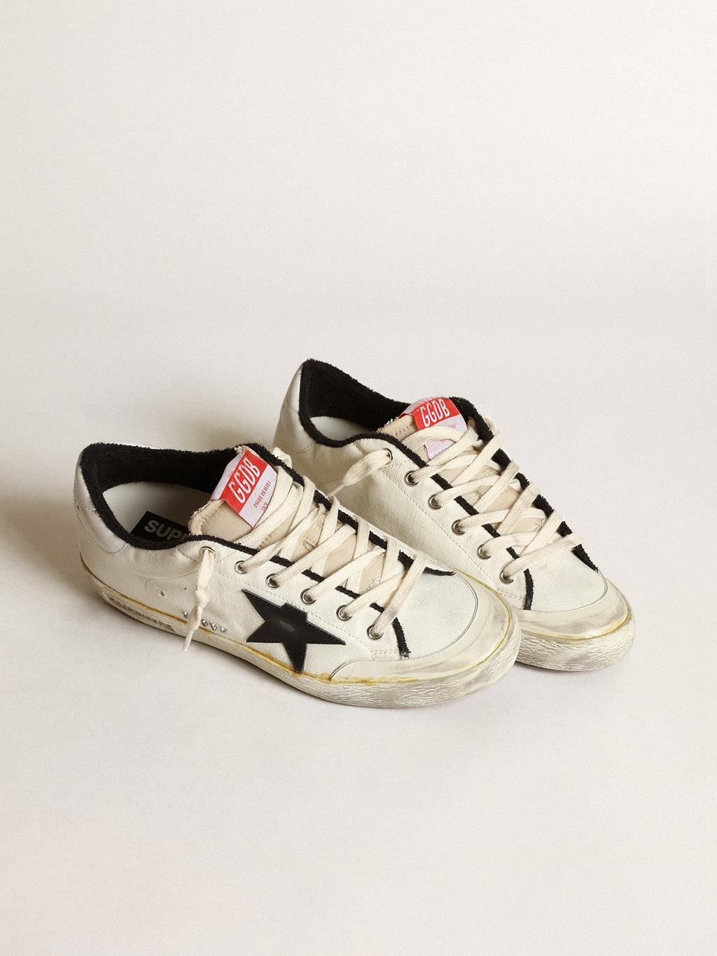Men's Super-Star LTD in beige canvas with black star| Golden Goose