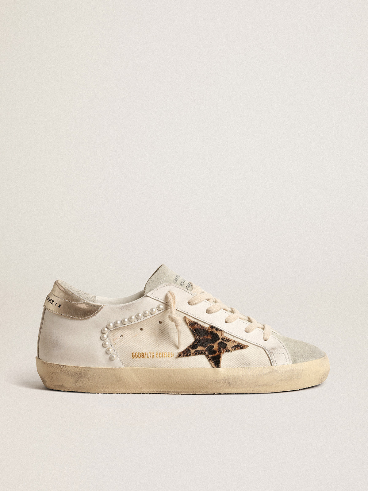 Super-Star LTD in canvas and leather with leopard-print pony skin star| Golden Goose