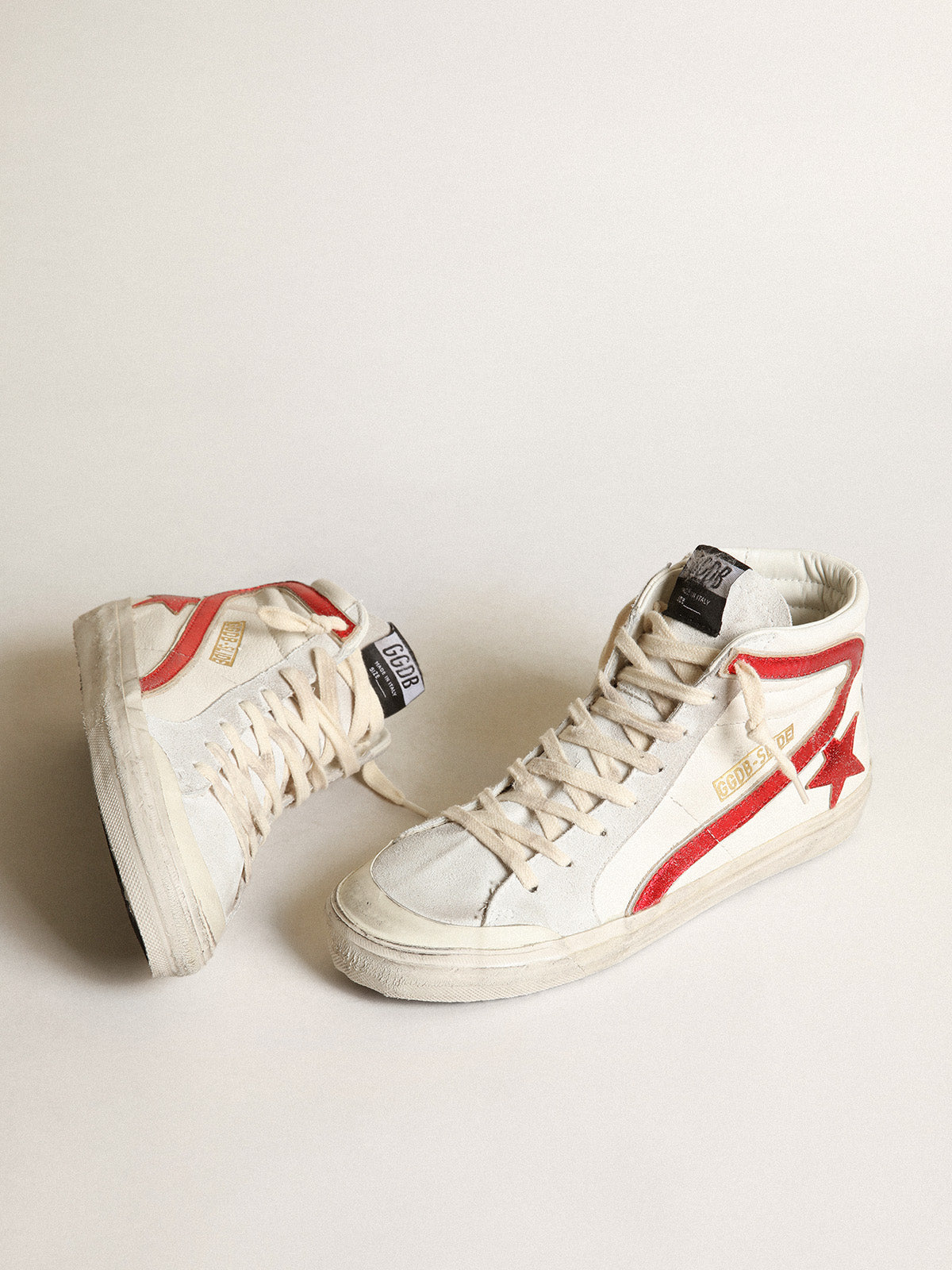 Slide with a red laminated leather star and flash| Golden Goose