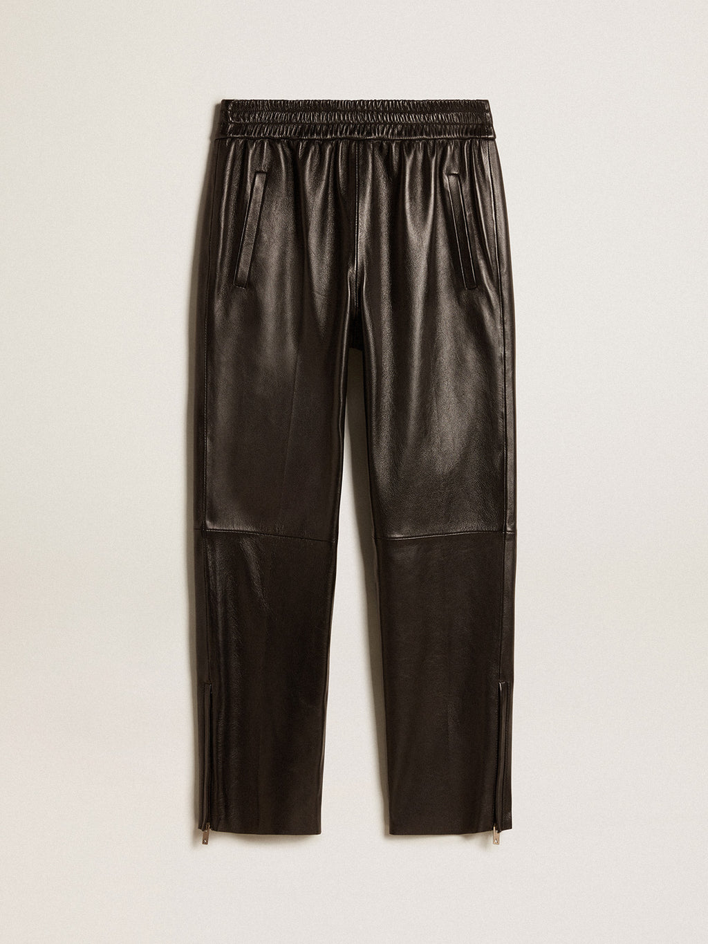 Black joggers in nappa leather with zip at the base| Golden Goose