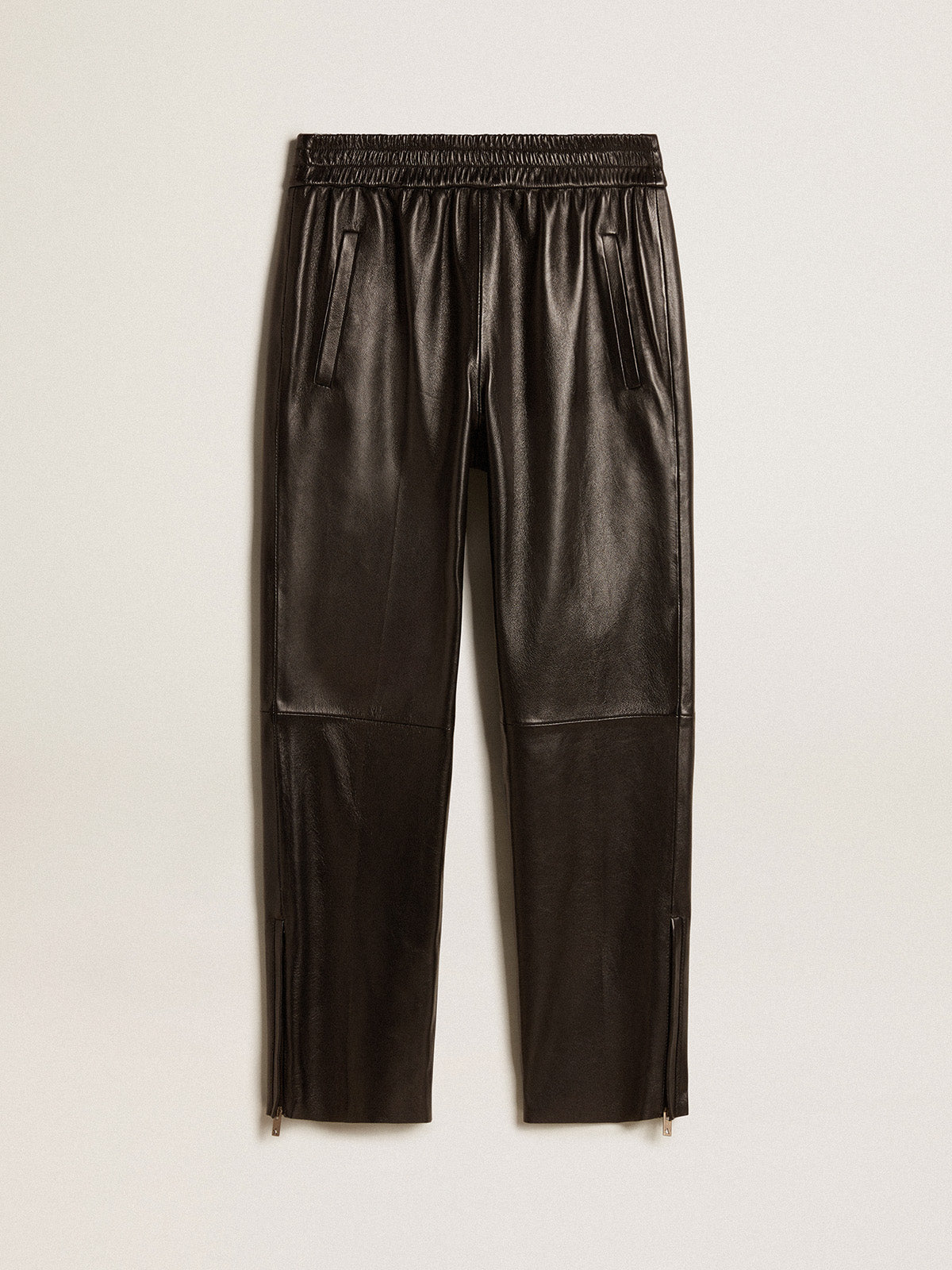 Black joggers in nappa leather with zip at the base| Golden Goose