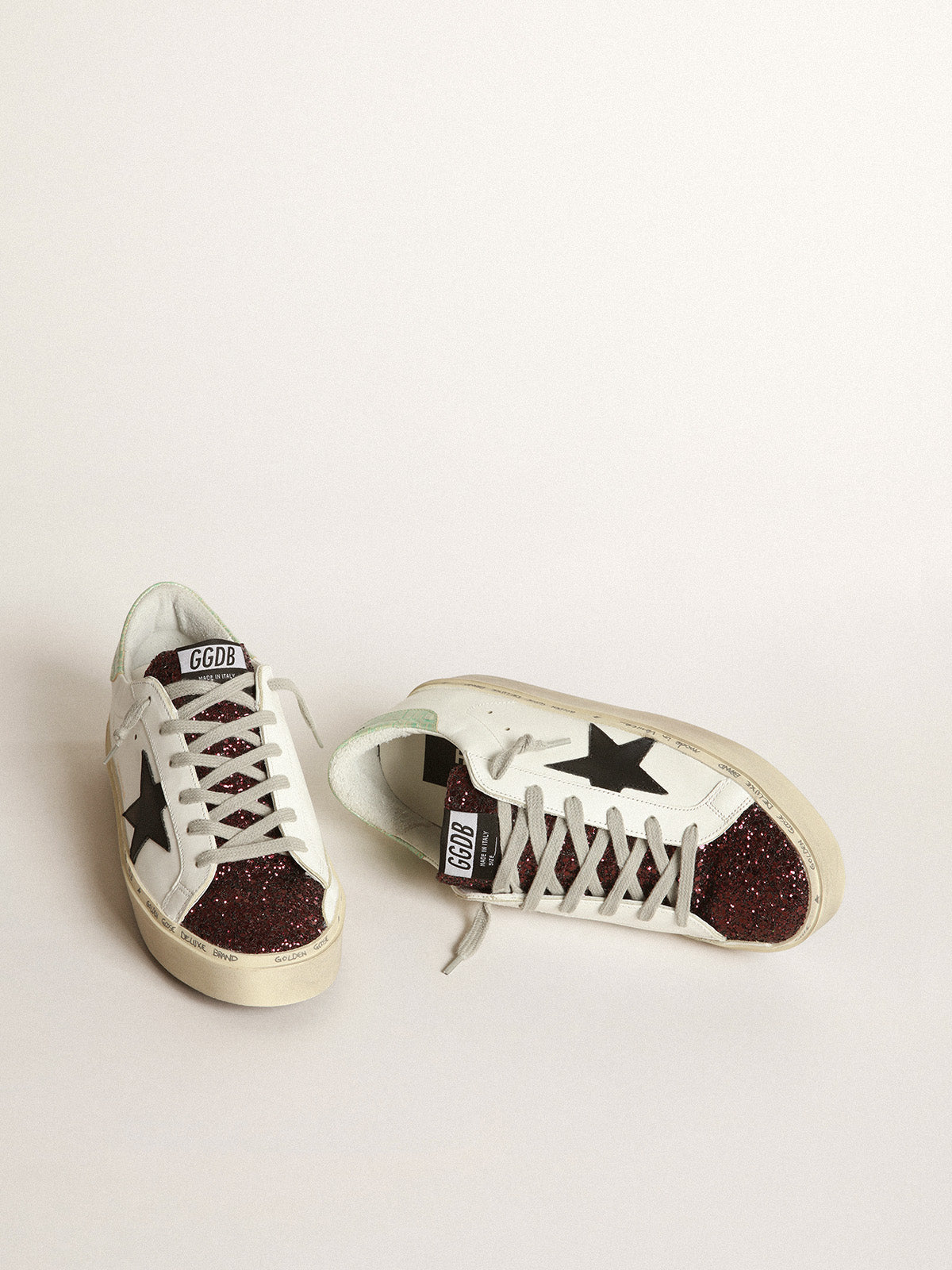 White Hi-Star sneakers with glittery insert and black star| Golden Goose