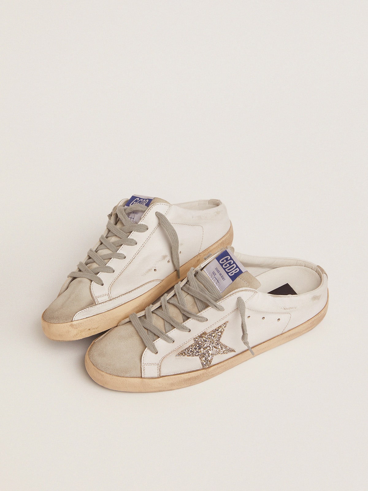 Super-Star Sabot with a platinum glitter star and suede tongue| Golden Goose