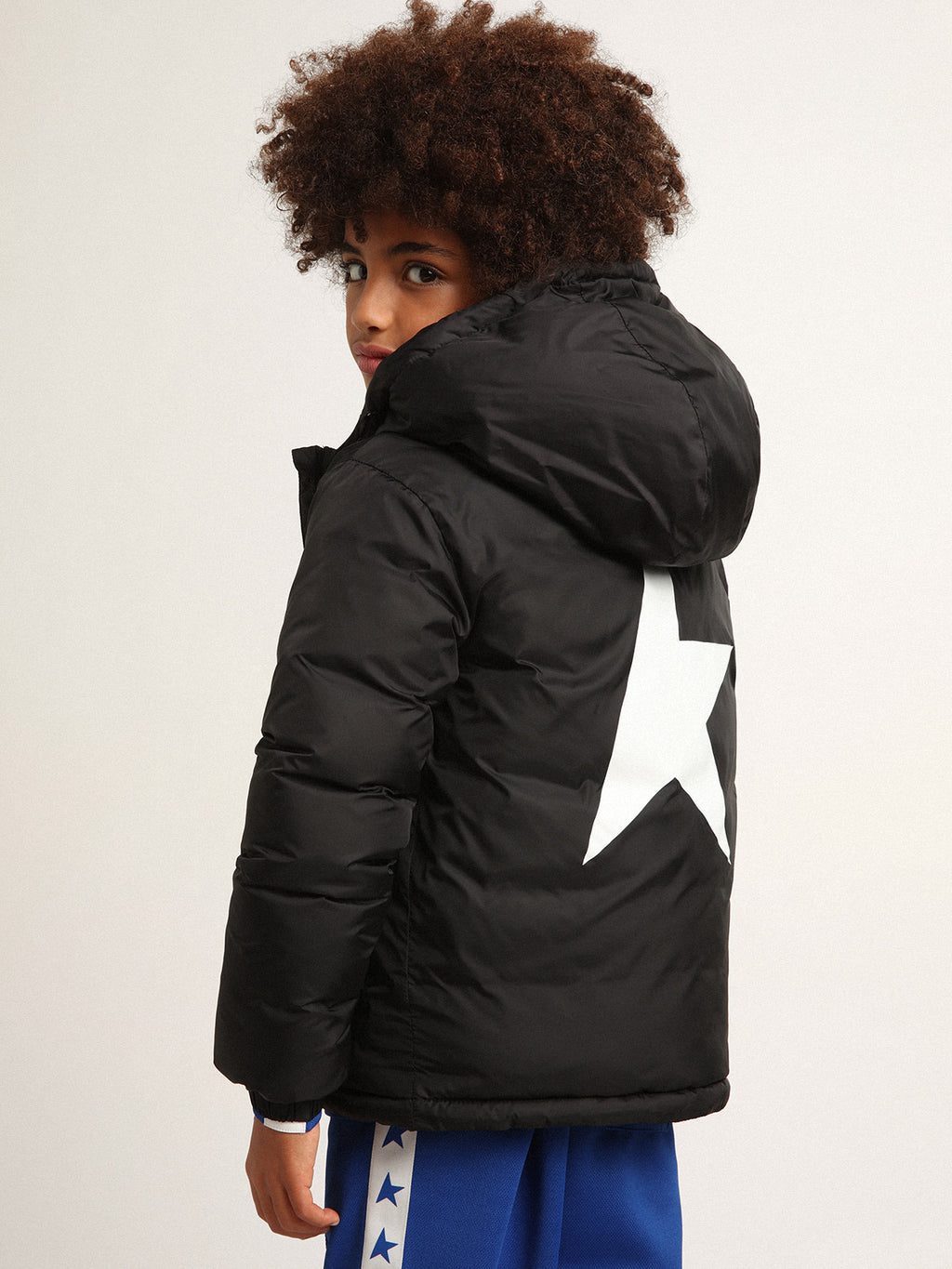 Black jacket with hood and maxi star on the back| Golden Goose