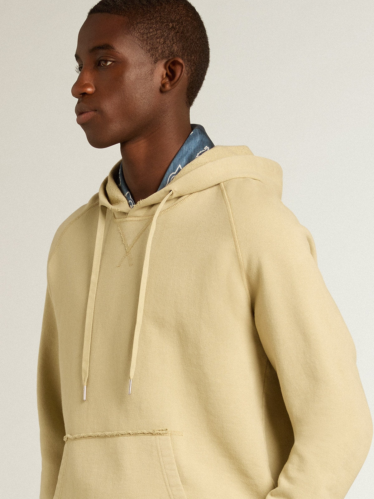 Pale eucalyptus-colored hoodie with front pocket| Golden Goose