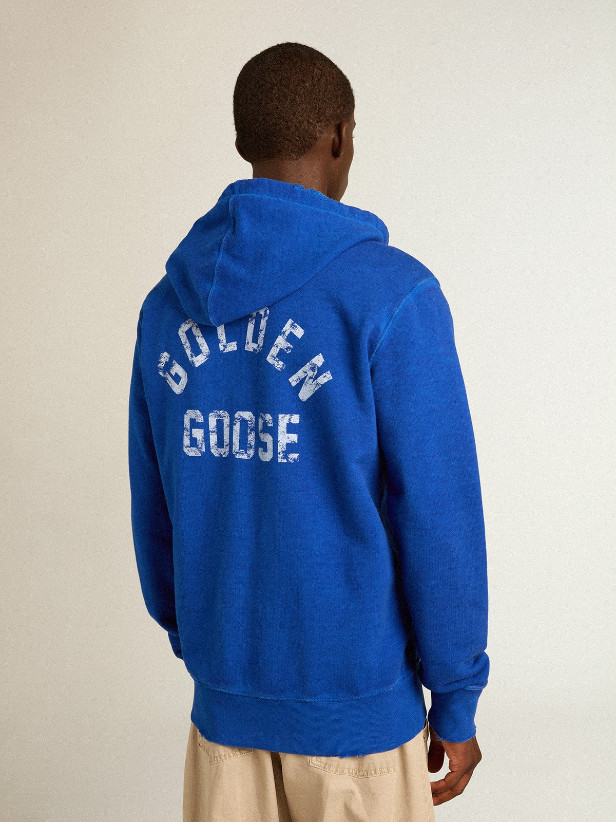 Men's blue-colored hoodie with lettering on the back| Golden Goose