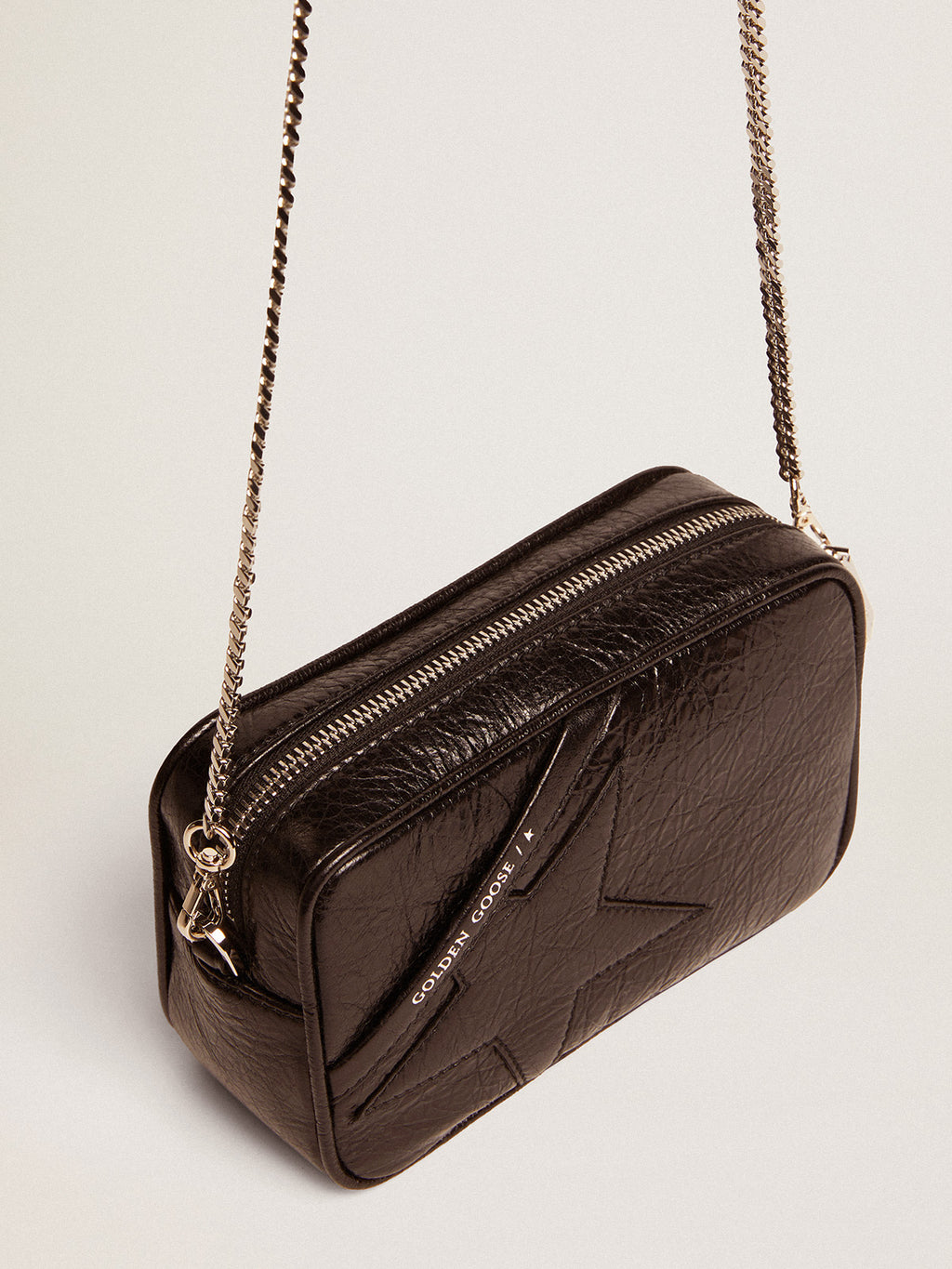 Women's Mini Star Bag in black glossy leather with tone-on-tone star| Golden Goose