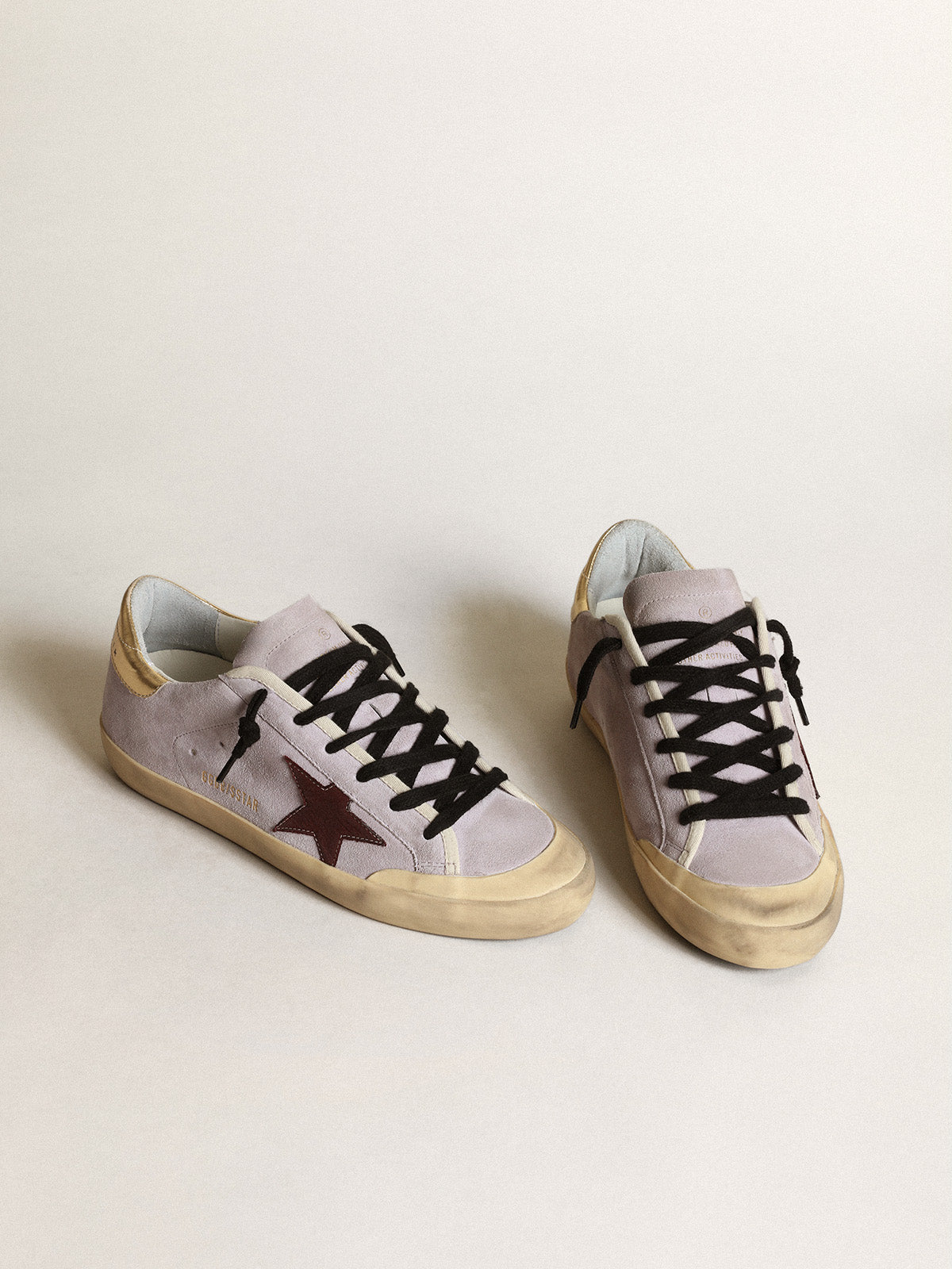 Super-Star in lilac suede with a brown star and gold heel tab| Golden Goose