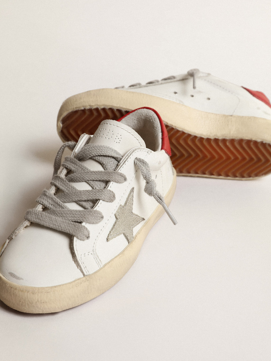Super-Star Young with suede star and red leather heel tab| Golden Goose