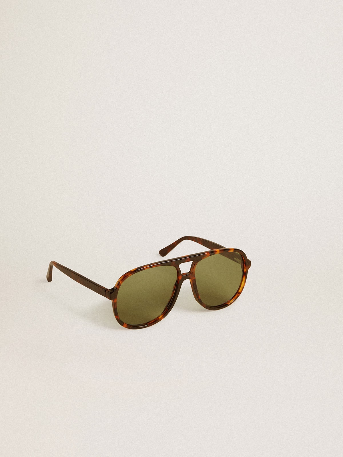 Aviator style sunglasses with tortoiseshell frame and green lenses| Golden Goose