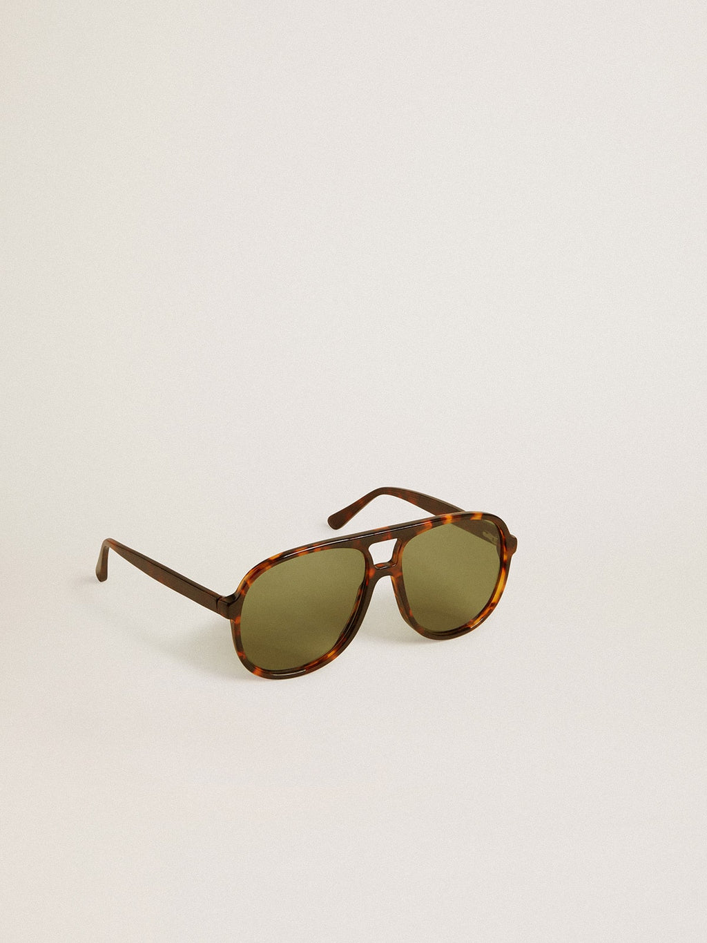 Aviator style sunglasses with tortoiseshell frame and green lenses| Golden Goose