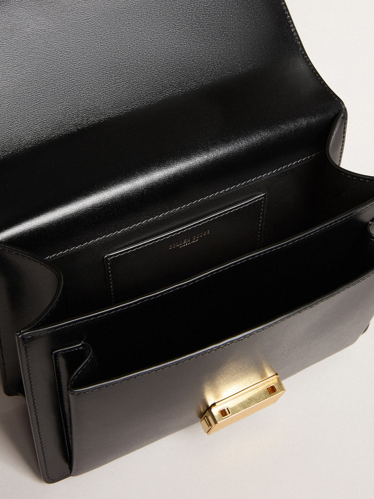 Venezia Bag in black boarded leather with gold details| Golden Goose