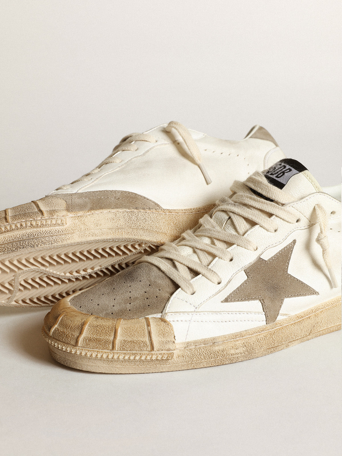 Men's Ball Star LTD sneakers in white nappa leather with dove-gray suede star and heel tab| Golden Goose