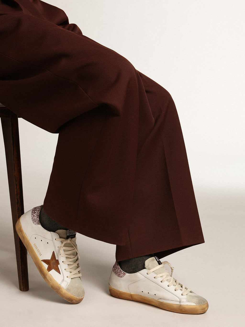 Super-Star with a tan star and pink glitter heel tab| Golden Goose